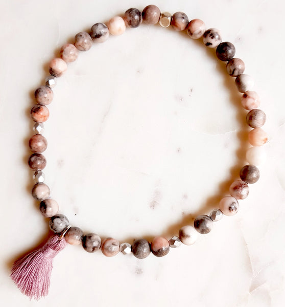 Aria Mala Atelier's unique one-of-a-kind Zebra Jasper with cotton tassel for spiritual living