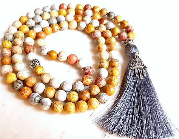 Aria Mala Atelier's unique one-of-a-kind sky eye jasper gemstone meditation japa mala with hamsa is for yoga meditation spiritual daily practise intention