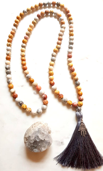 Aria Mala Atelier's unique one-of-a-kind sky eye jasper gemstone meditation japa mala with hamsa is for yoga meditation spiritual daily practise intention