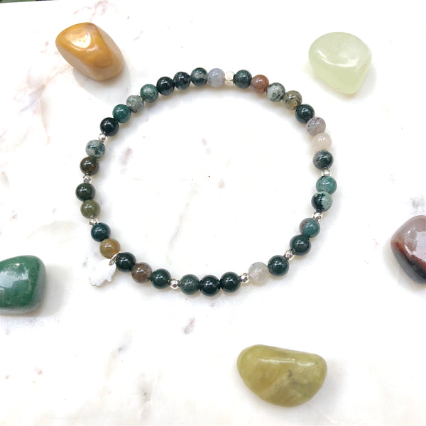 Aria Mala Atelier's unique one-of-a-kind Agate yoga anklet with sterling silver Hamsa (Fatima's Hand) charm for spiritual living and mindfulness practices