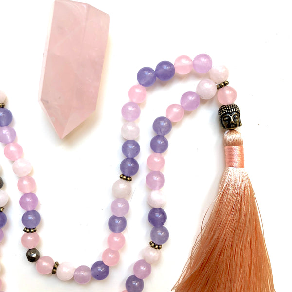 Aria Mala Atelier's unique one-of-a-kind lavender, rose jade, pyrite and sandalwood gemstone meditation japa mala with third eye chakra and buddha symbol charm is for yoga meditation empowering spiritual, mindfulness daily practise, intention setting