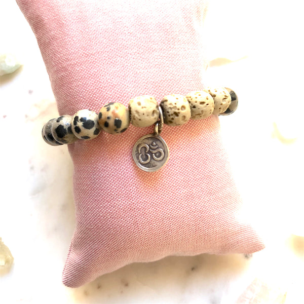 Aria Mala Atelier's unique one-of-a-kind Jasper and White Lava stone with OM charm for spiritual living