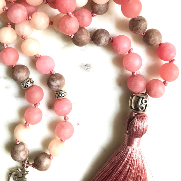 Aria Mala Atelier's unique one-of-a-kind mat jade gemstone meditation japa mala with Silver Charm OM and Yin&Yang Gurubead is for yoga meditation empowering spiritual daily practise and intention setting