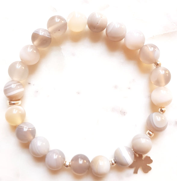 Aria Mala Atelier's unique one-of-a-kind Grey Agathe yoga bracelet with sterling silver Clover symbol charm for spiritual living