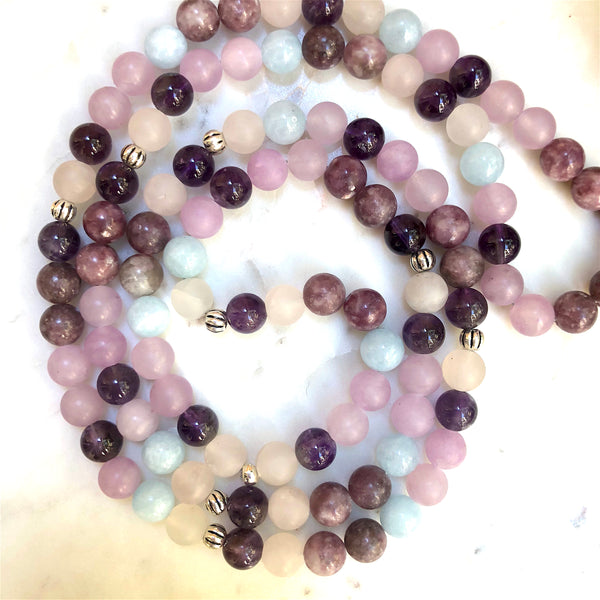 Aria Mala Atelier's unique one-of-a-kind Aquamarine, Quartz, Amethyst, Lepidolite, Jade gemstone meditation japa mala with silver mandala charm is for yoga meditation empowering spiritual daily practise and intention setting