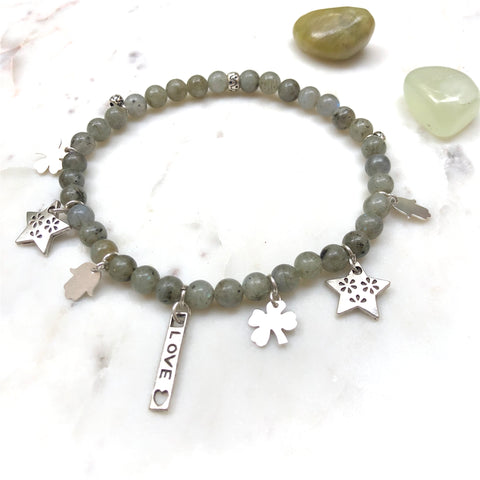 Aria Mala Atelier's unique one-of-a-kind Labradorite, Hamsa, Clover, Star, Love symbol charms for spiritual living and mindfulness practices