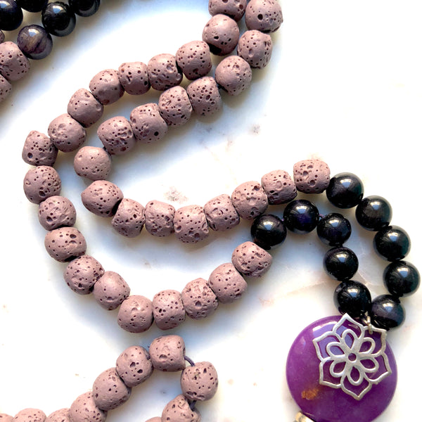 Aria Mala Atelier's unique one-of-a-kind lilac lavastone, purple jade gemstone meditation japa mala with silver mandala charm is for yoga meditation empowering spiritual daily practise and intention setting