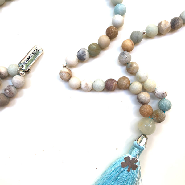 Aria Mala Atelier's unique one-of-a-kind mat natural amazonite meditation japa mala with clover and namaste silver charm is for yoga meditation empowering spiritual daily practise and intention setting, mindfulness practices