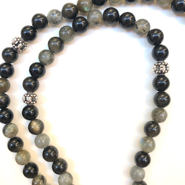 Aria Mala Atelier's unique one-of-a-kind Protective Labradorit and Obsidian gemstone meditation japa mala with silver charm is for yoga meditation empowering spiritual daily practise and intention setting