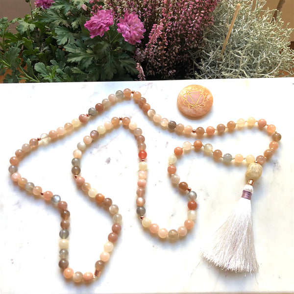 Aria Mala Atelier's unique one-of-a-kind feminine power Peach Moonstone gemstone meditation japa mala with rose color sterling silver charm is for yoga meditation empowering spiritual daily practise and intention setting