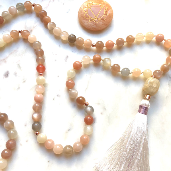 Aria Mala Atelier's unique one-of-a-kind feminine power Peach Moonstone gemstone meditation japa mala with rose color sterling silver charm is for yoga meditation empowering spiritual daily practise and intention setting