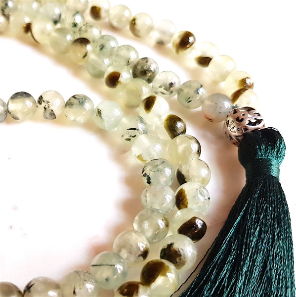 Aria Mala Atelier's unique one-of-a-kind prehnite, Stone of Unconditional Love gemstone meditation japa mala with silver guru bead is for yoga meditation empowering spiritual daily practise and intention setting