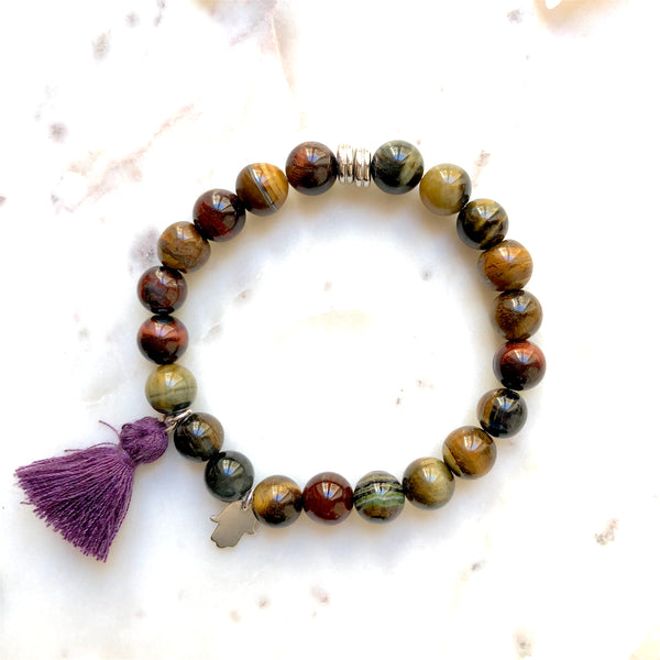 Aria Mala Atelier's unique one-of-a-kind Tiger's eye yoga bracelet with sterling silver Hamsa (Fatima's Hand) charm for spiritual living