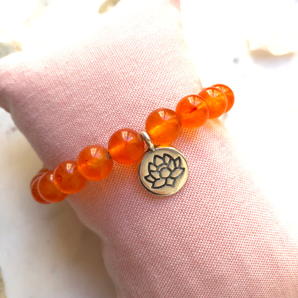 Aria Mala Atelier's unique one-of-a-kind Sun color agate with Lotus charm for spiritual living