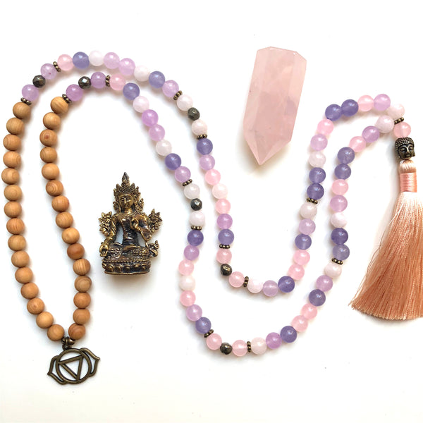 Aria Mala Atelier's unique one-of-a-kind lavender, rose jade, pyrite and sandalwood gemstone meditation japa mala with third eye chakra and buddha symbol charm is for yoga meditation empowering spiritual, mindfulness daily practise, intention setting