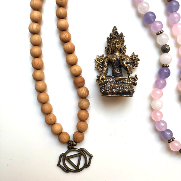 Aria Mala Atelier's unique one-of-a-kind lavender, rose jade, pyrite and sandalwood gemstone meditation japa mala with third eye chakra and buddha symbol charm is for yoga meditation empowering spiritual, mindfulness daily practise, intention setting