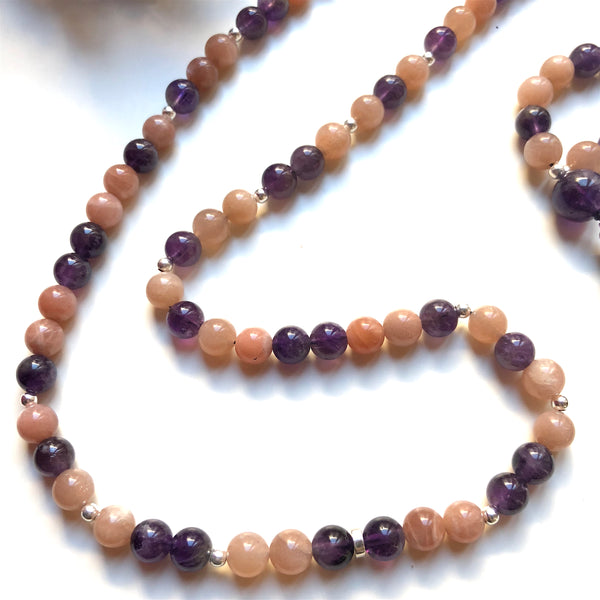 Aria Mala Atelier's unique one-of-a-kind rose Moonstone, amethyst gemstone meditation japa mala with sterling silver mandala charm is for yoga meditation empowering spiritual daily practise and intention setting