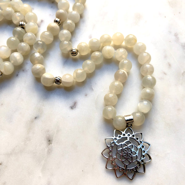 Aria Mala Atelier's unique one-of-a-kind white Moonstone with Sterling silver mandala charm is for yoga meditation empowering spiritual daily practise and intention setting