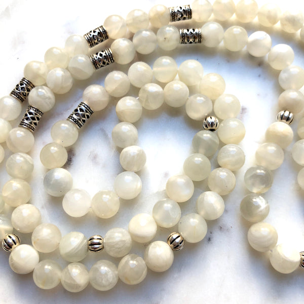 Aria Mala Atelier's unique one-of-a-kind white Moonstone with Sterling silver mandala charm is for yoga meditation empowering spiritual daily practise and intention setting