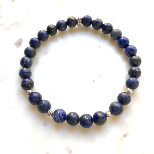 Aria Mala Atelier's unique one-of-a-kind Lapis Lazuli, Aquamarine silver charm yoga bracelet for spiritual living