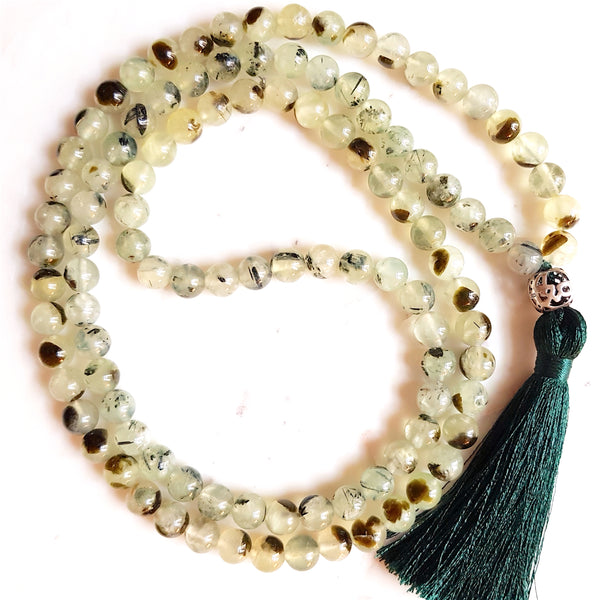 Aria Mala Atelier's unique one-of-a-kind prehnite, Stone of Unconditional Love gemstone meditation japa mala with silver guru bead is for yoga meditation empowering spiritual daily practise and intention setting