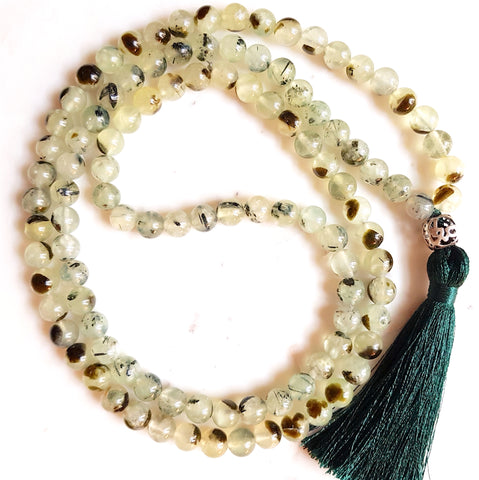 Aria Mala Atelier's unique one-of-a-kind prehnite, Stone of Unconditional Love gemstone meditation japa mala with silver guru bead is for yoga meditation empowering spiritual daily practise and intention setting