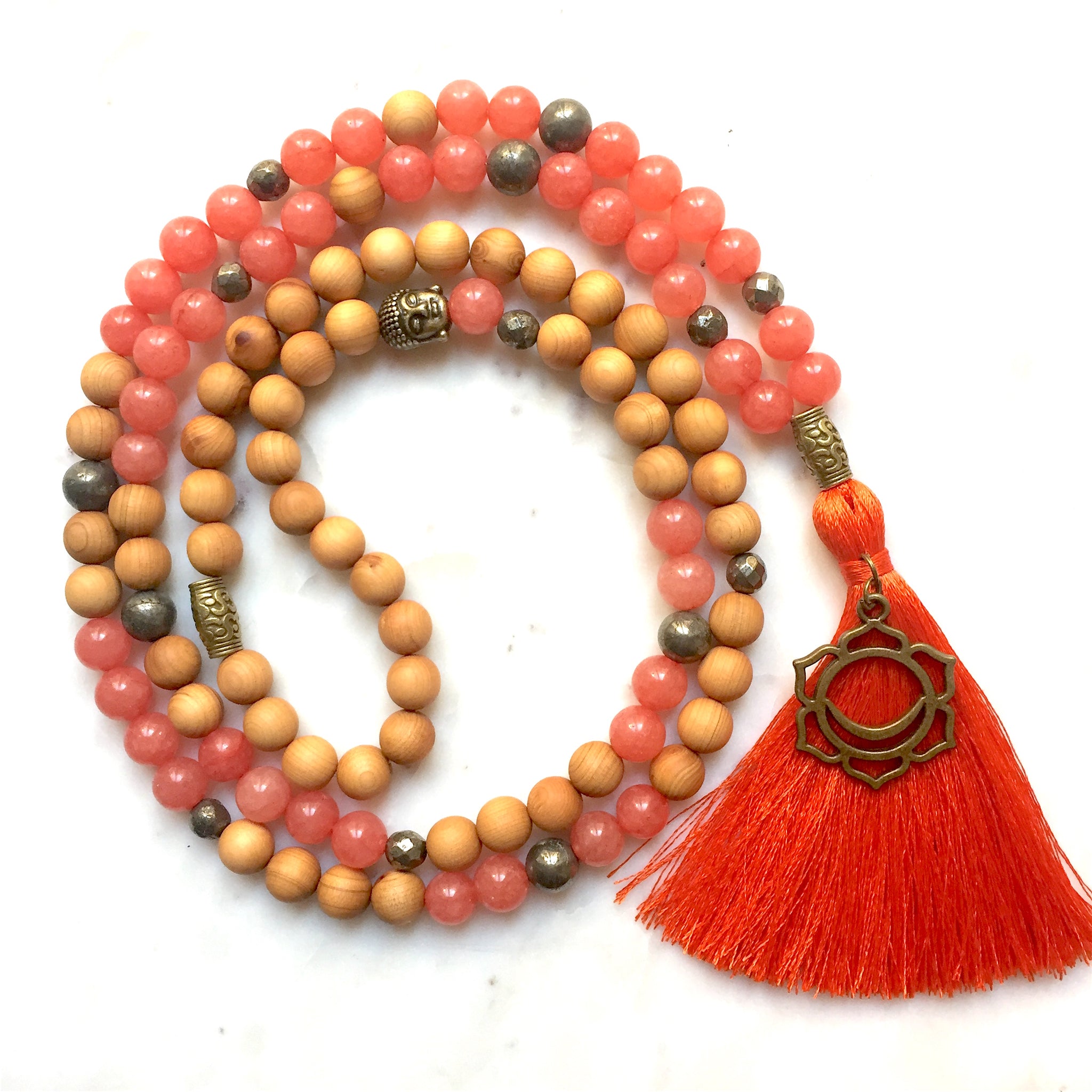Aria Mala Atelier's unique one-of-a-kind tangerine, Sacral Chakra, Jade, Pyrite, Sandalwood Japa Mala is for yoga meditation empowering spiritual daily practise and intention setting