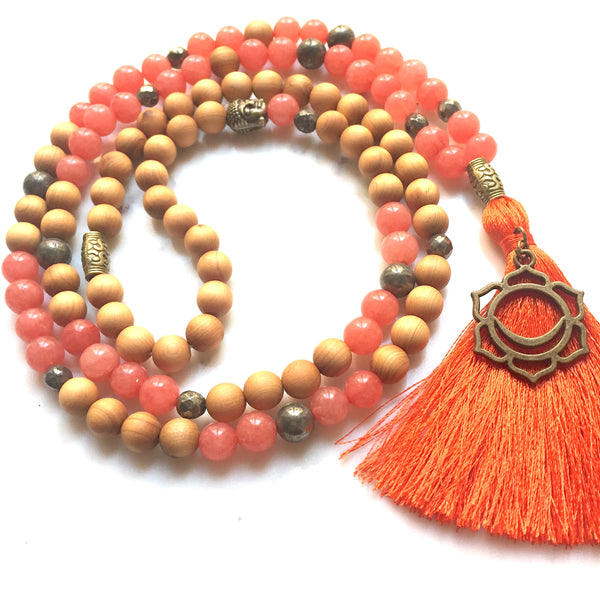 Aria Mala Atelier's unique one-of-a-kind tangerine, Sacral Chakra, Jade, Pyrite, Sandalwood Japa Mala is for yoga meditation empowering spiritual daily practise and intention setting