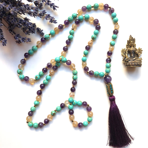 Aria Mala Atelier's unique one-of-a-kind Turquoise, Amethyst, Citrine Japa/Meditation Mala with Nepal guru bead is for yoga meditation empowering spiritual daily practise and intention setting