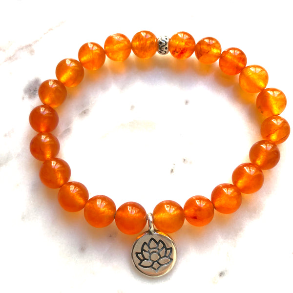 Aria Mala Atelier's unique one-of-a-kind Sun color agate with Lotus charm for spiritual living