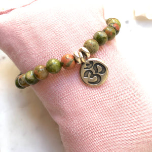Aria Mala Atelier's unique one-of-a-kind Unakite yoga bracelet with OM charm for spiritual living